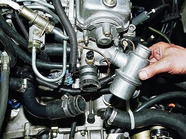 Подробная инструкция по самостоятельной замене термостата на ВАЗ 2114